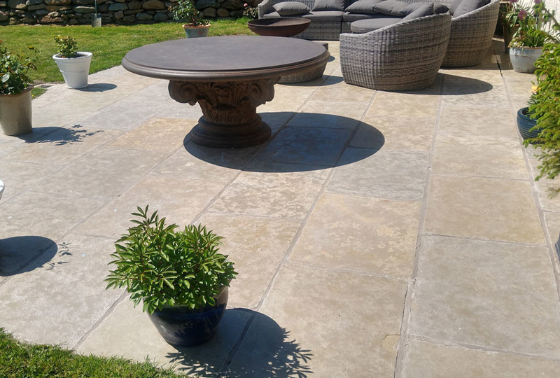 A Jaipur limestone paving patio cleared of black spots